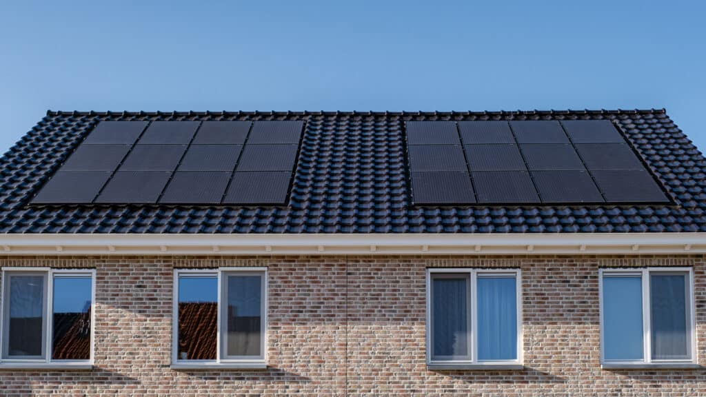 Solar panels on roof of house by Moy Solar