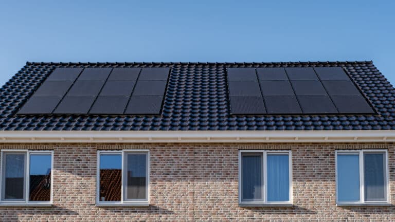Solar panels on roof of house by Moy Solar